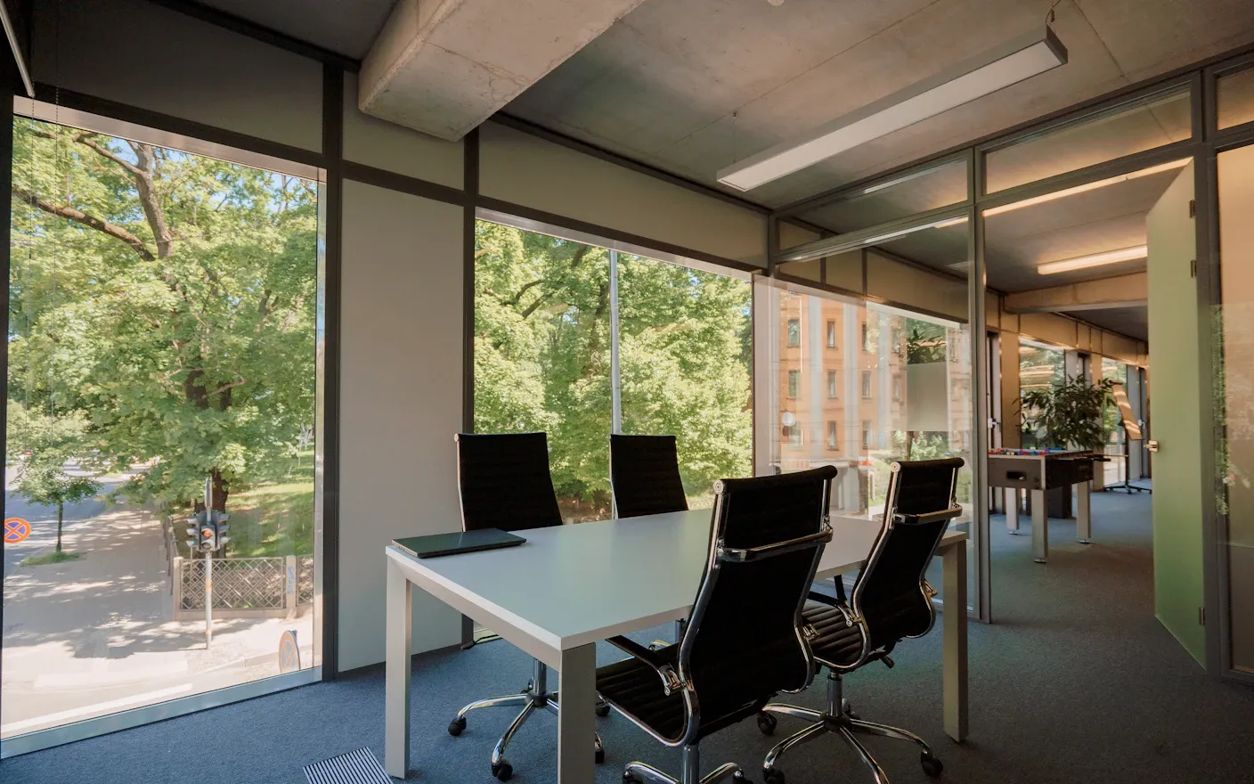 An office interior behind a glazed facade