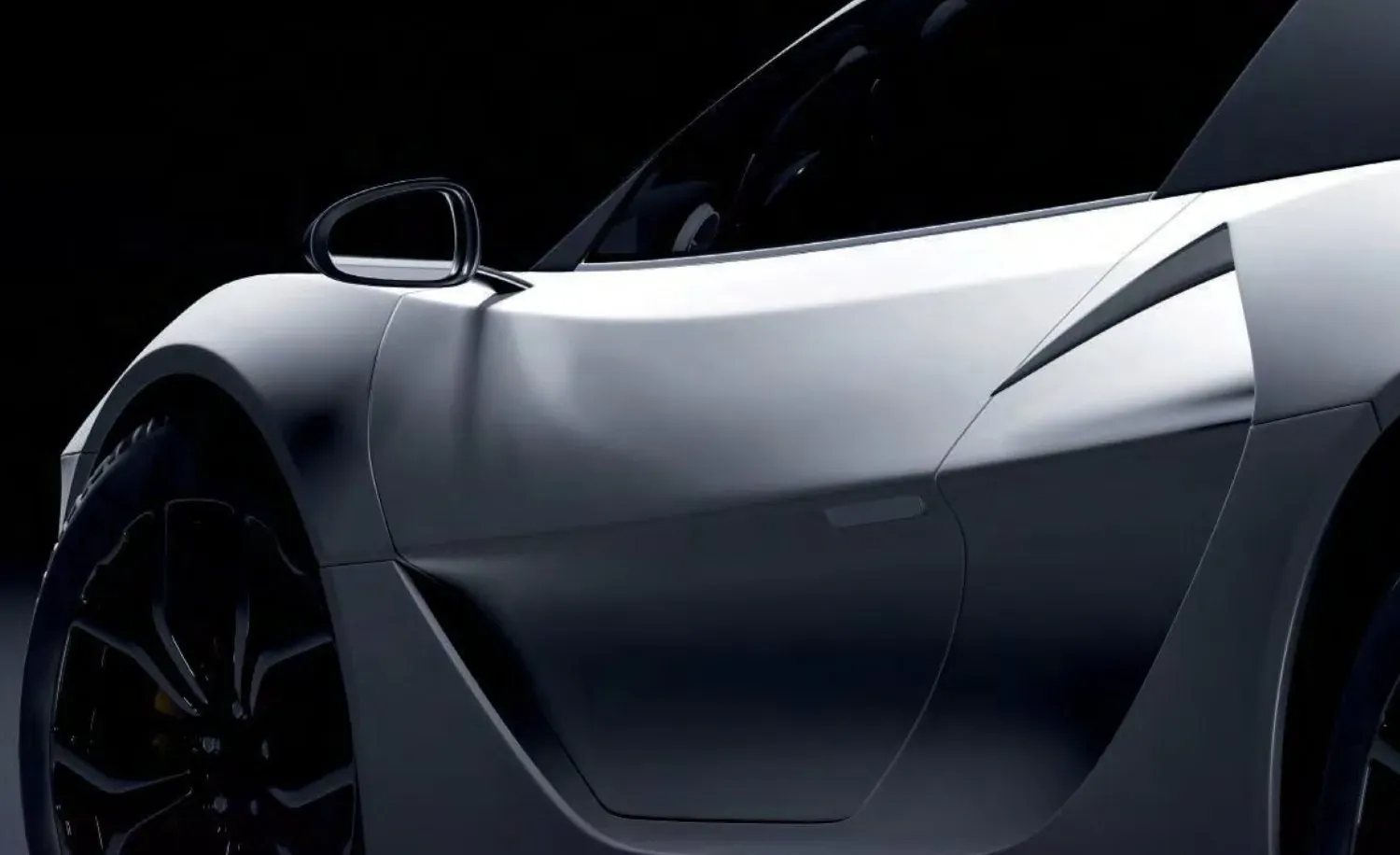 A car with tinted glass, three quarter view under studio light
